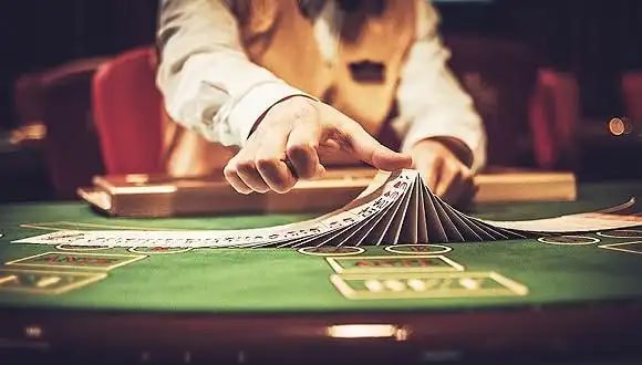 over under live dealer interface displayed on mobile app showing blackjack table with dealer and player controls